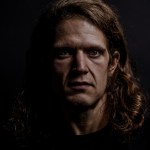 Adam Jones of S U R V I V E